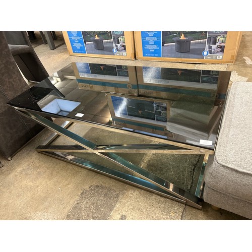 3191 - A black glass and chrome coffee table