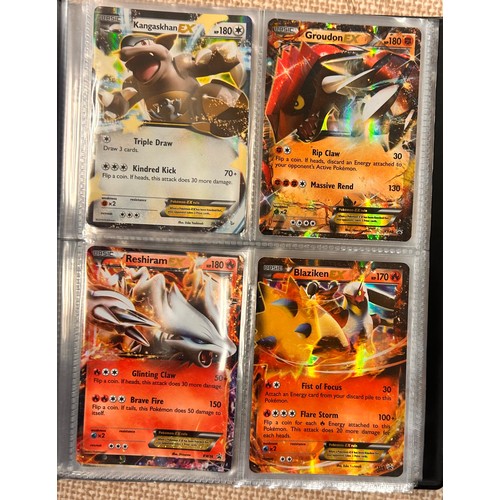 2023 - A folder of vintage Pokémon holographic cards including Ex Mega cards, etc., and holographic 2000 Te... 