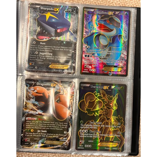 2023 - A folder of vintage Pokémon holographic cards including Ex Mega cards, etc., and holographic 2000 Te... 