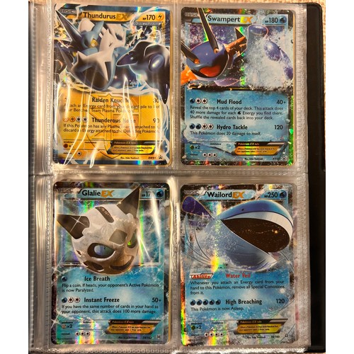 2023 - A folder of vintage Pokémon holographic cards including Ex Mega cards, etc., and holographic 2000 Te... 