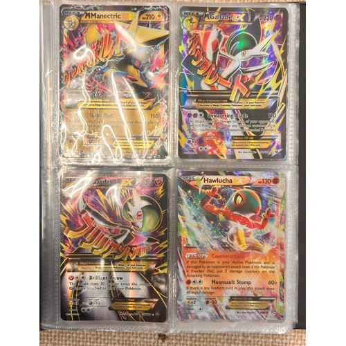 2023 - A folder of vintage Pokémon holographic cards including Ex Mega cards, etc., and holographic 2000 Te... 