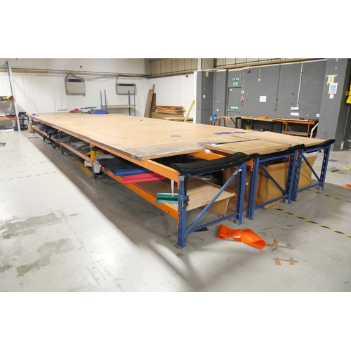 8003 - A very large work 10.4m x 3m sectional table assembled from cut-down racking sections - 80cm height.... 