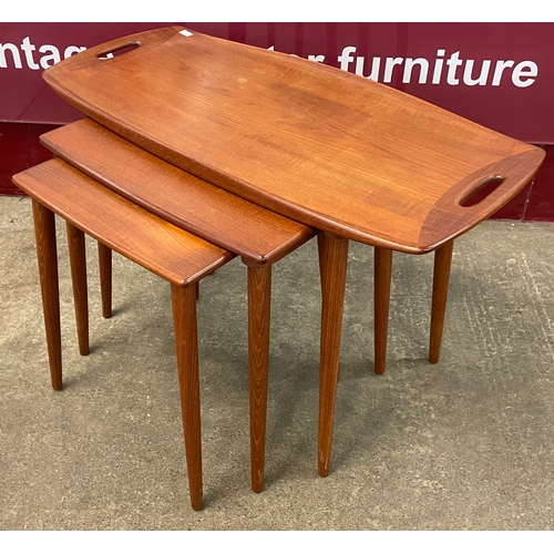 10 - A Danish Richard Nissen teak nest of tables, designed by Jens Quistgaard