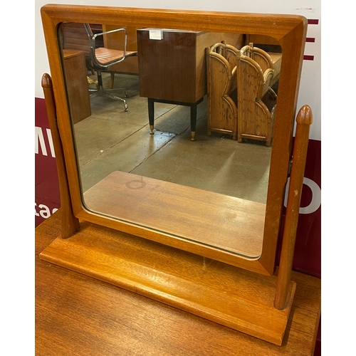 16 - A teak dressing table mirror