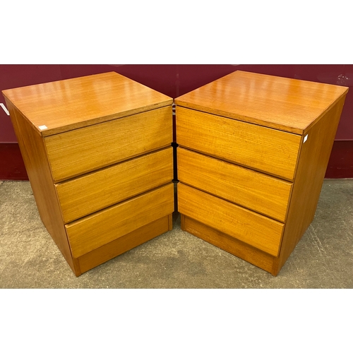 17 - A pair of teak bedside chests