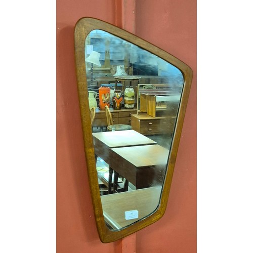 30 - A Danish teak asymmetrical framed mirror