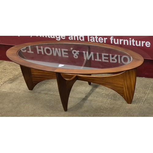 32 - A G-Plan Astro teak and glass topped oval coffee table