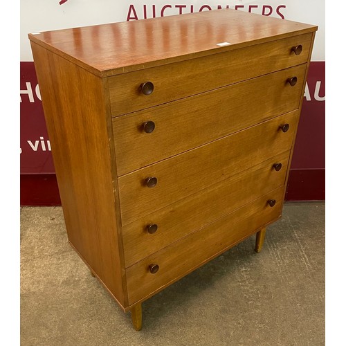 52 - A teak chest of drawers