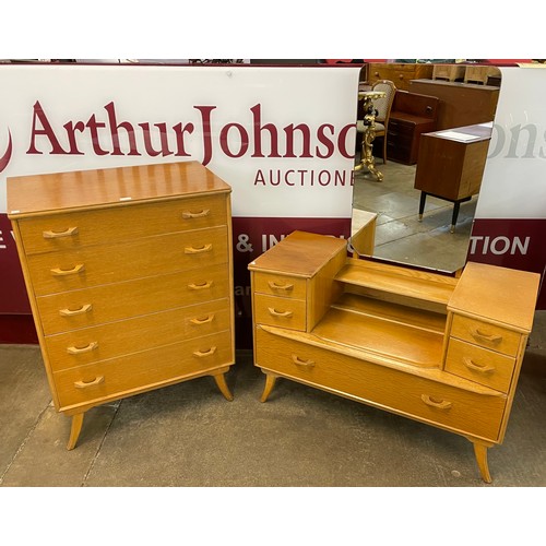 54 - A Beeanese light oak chest of drawers and dressing table