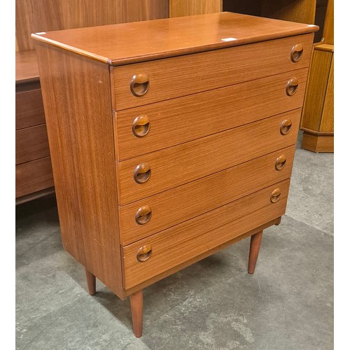 103 - A teak chest of drawers