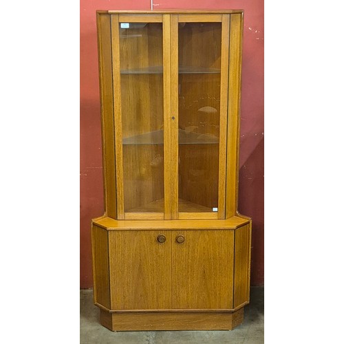 108 - A Turnidge of London teak corner cabinet