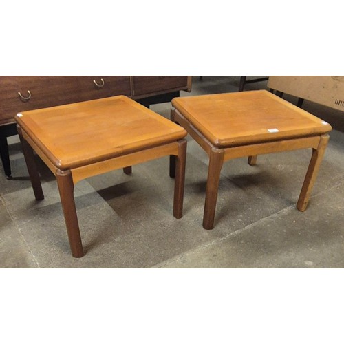 114 - A pair of Nathan square teak occasional tables