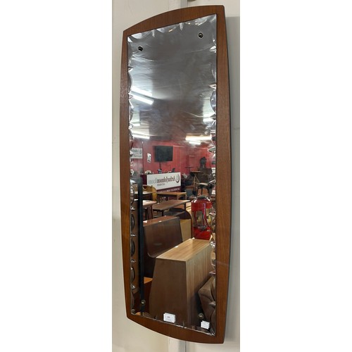 69 - A teak framed mirror