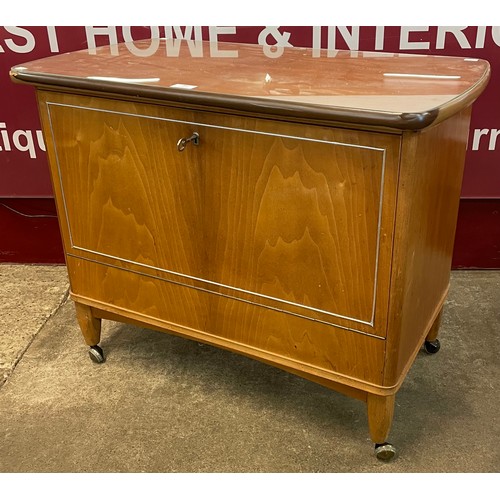 87 - A walnut cocktail cabinet