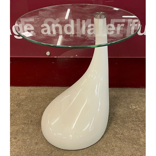 88 - A glass topped tear drop shaped occasional table