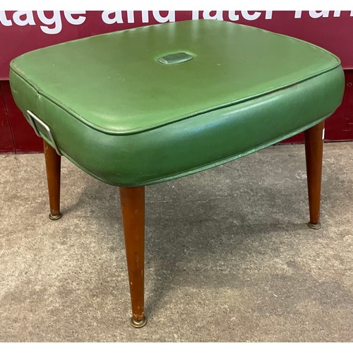 90 - A Sherbourne teak and green leather upholstered pouffe