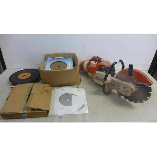 5001 - A Stihl TS350 petrol stone cutting saw with a quantity of various saw blades