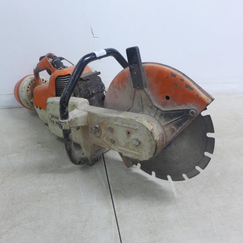 5001 - A Stihl TS350 petrol stone cutting saw with a quantity of  various saw blades