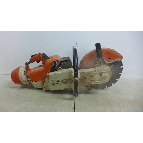 5001 - A Stihl TS350 petrol stone cutting saw with a quantity of  various saw blades