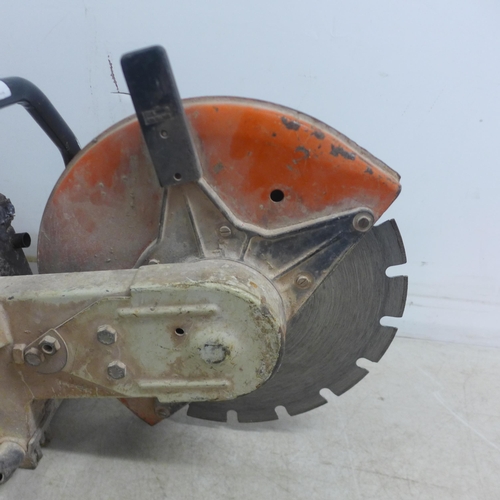 5001 - A Stihl TS350 petrol stone cutting saw with a quantity of various saw blades