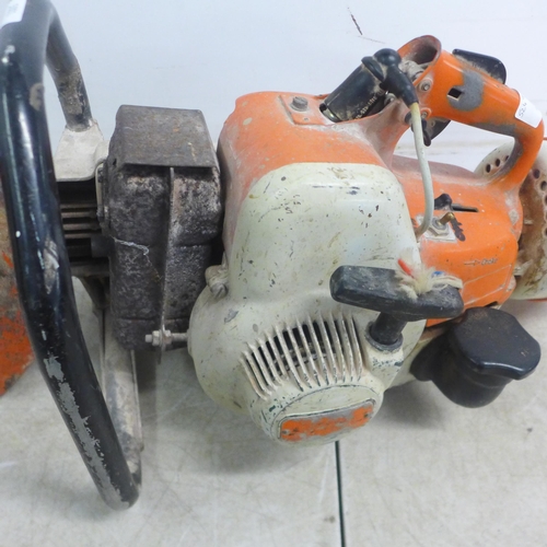 5001 - A Stihl TS350 petrol stone cutting saw with a quantity of various saw blades