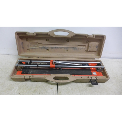 5032 - Four assorted tile cutters - a Tomecanic Scribe cutter and Three Clipper TG 200 BP 110v cutters