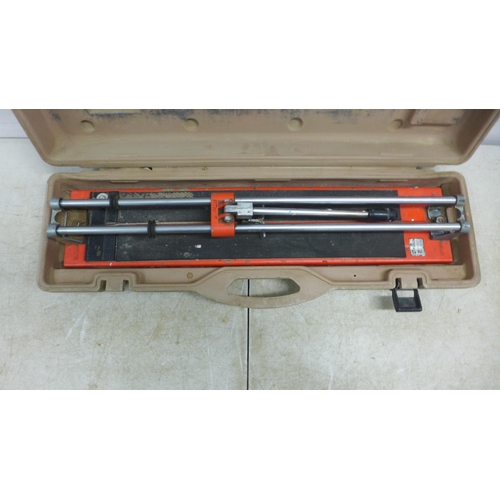 5032 - Four assorted tile cutters - a Tomecanic Scribe cutter and 3 Clipper TG 200 BP 110v cutters