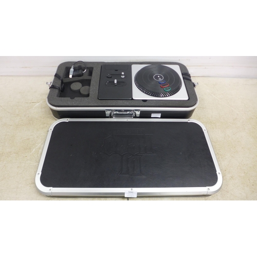 5042 - A PlayStation DJ Hero wireless turntable controller, cased, no game