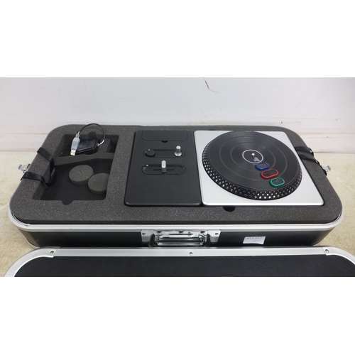 5042 - A PlayStation DJ Hero wireless turntable controller, cased, no game