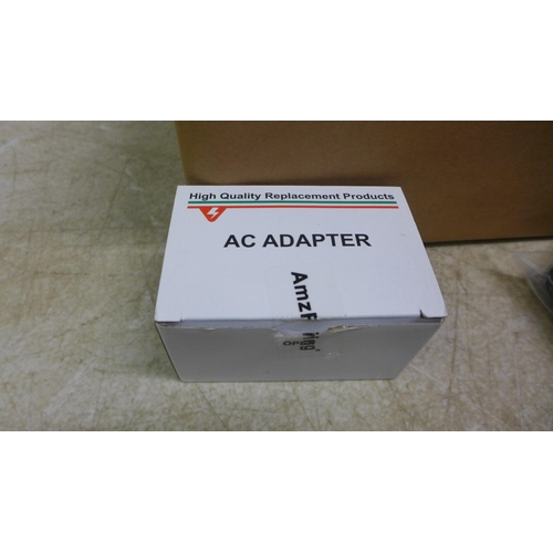 5048 - A box of approximately 30 various AC adaptors