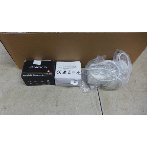 5056 - A box of approximately 20 various AC adapters