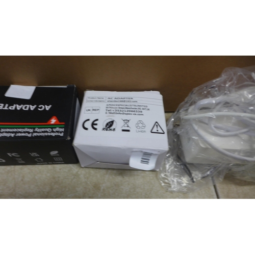 5056 - A box of approximately 20 various AC adaptors