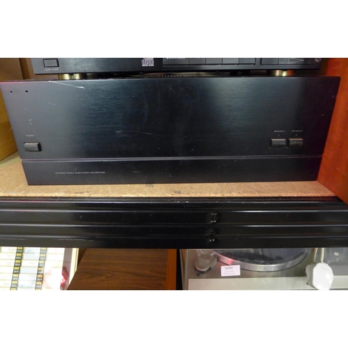 5087 - A Sherwood AM-8500B power amp, an Alpha 5 Plus amplifier, a Kenwood DP520 CD player and a Sansui AT-... 