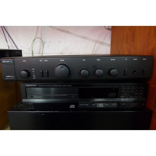 5087 - A Sherwood AM-8500B power amp, an Alpha 5 Plus amplifier, a Kenwood DP520 CD player and a Sansui AT-... 