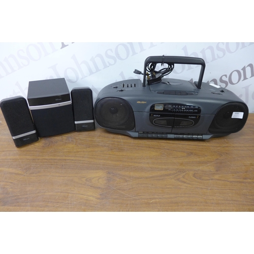 5095 - A Bush SRC280CD portable CD player with a Trust PC speaker system