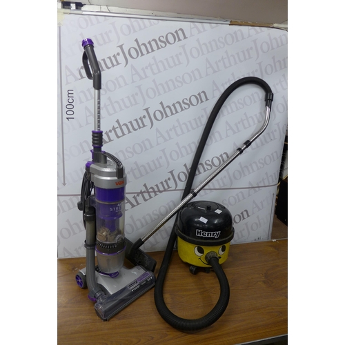 5115 - A Harry HVR200 vacuum cleaner and a Vax Air Stretch Pet Max upright vacuum cleaner