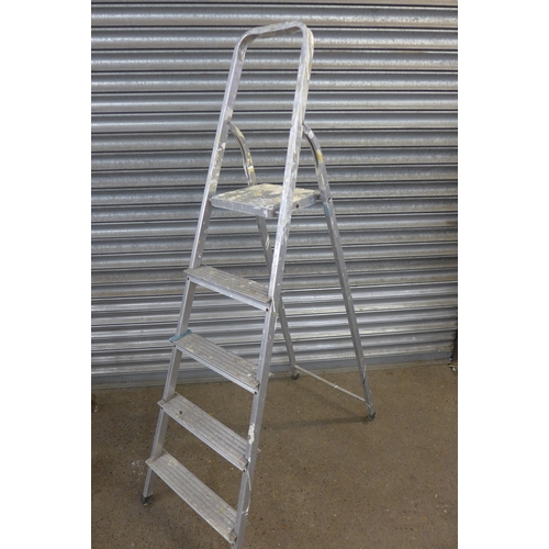 5120 - Two wooden stepladders and one metal step ladder