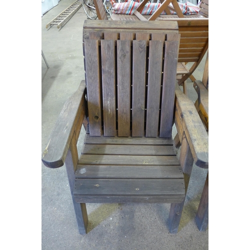 5122 - A hard wood garden bench and armchair