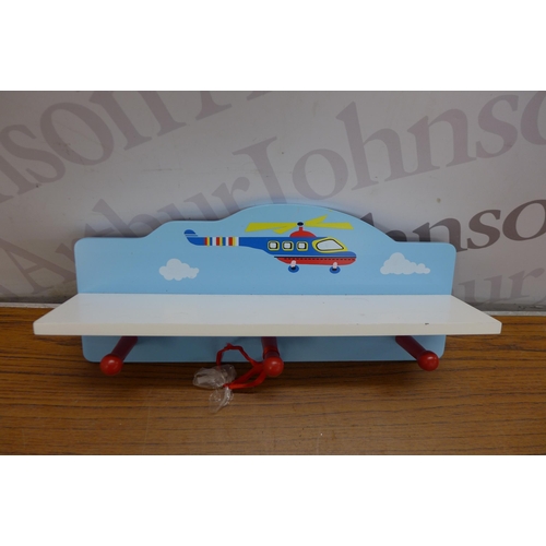 5194A - A quantity of childrens airplane coat hangers and a shelf with coat hangers