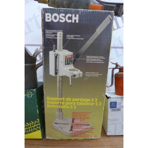 5216 - A box of assorted tools including a Bosch drill press, Black and Decker drill, a 9 piece dent puller... 