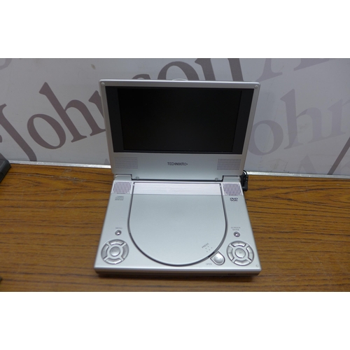 5227 - A Technika portable DVD player and 15 DVD's