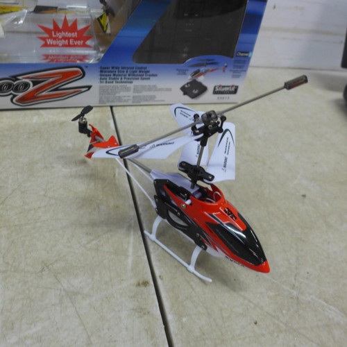 5041 - An X-Rotor Series PIC00-Z remote control helicopter, boxed with remote, a Syma remote control helico... 