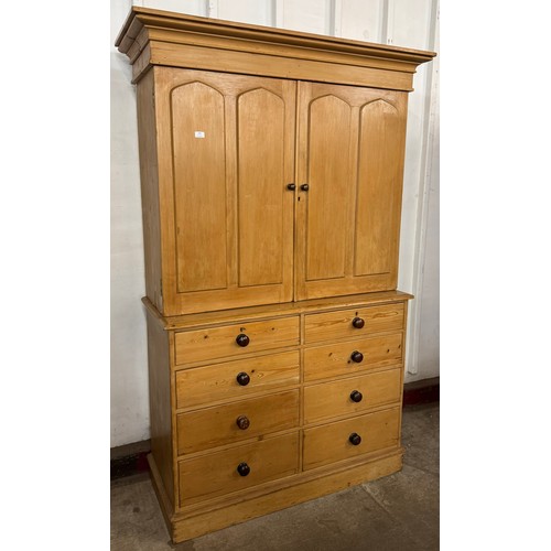 159 - A Victorian waxed pine housekeepers cupboard