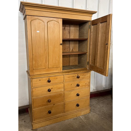 159 - A Victorian waxed pine housekeepers cupboard