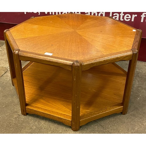 23 - A Danish teak octagonal coffee table