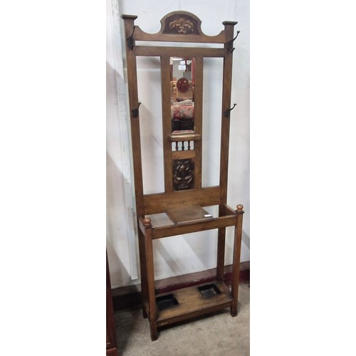 201 - An Arts & Crafts oak and copper hallstand