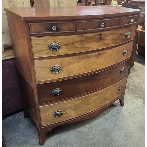 229 - A George III mahogany bow front chest of drawers