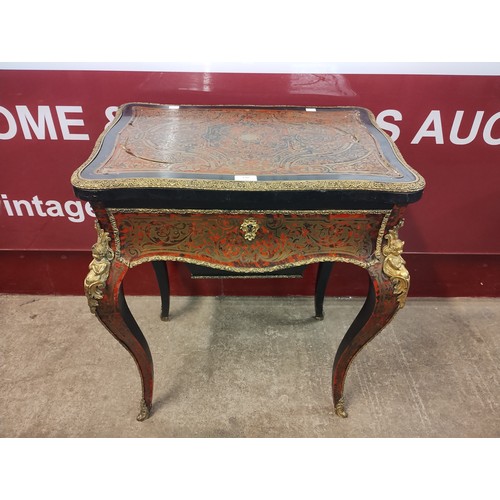 138 - A French Napoleon III Boulle Revival ebonised, tortoiseshell and ormolu mounted lady's vanity table