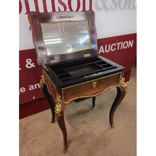 138 - A French Napoleon III Boulle Revival ebonised, tortoiseshell and ormolu mounted lady's vanity table