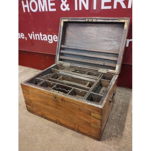 145 - A 19th Century Anglo-Indian teak and brass mounted fitted chest